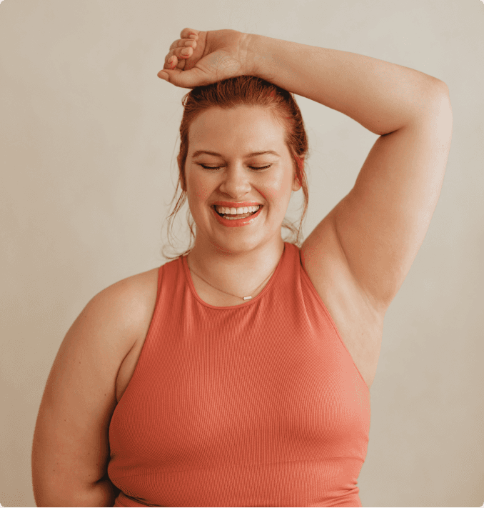 woman smiling in workout clothes