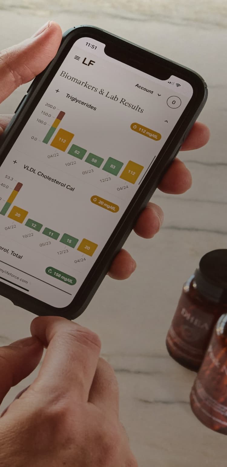 Guy looking at biomarkers on phone